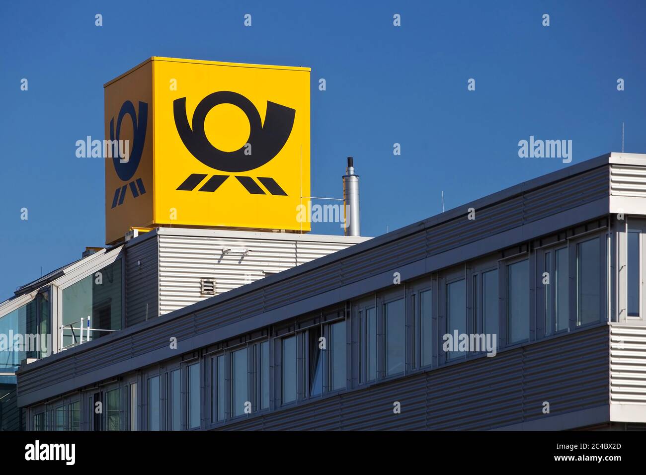 post horn, logo of the German Post, mail center Koeln West, Germany, North Rhine-Westphalia, Frechen Stock Photo