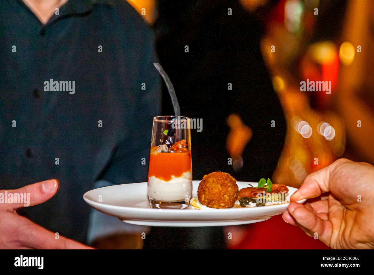 Finger food is presented with together with a dessert glass on the Rheingau Gourmet Festival in Hattenheim, Eltville am Rhein, Germany Stock Photo