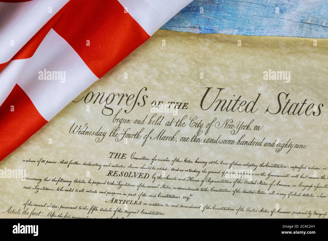 Closeup of ruffled American flag of the preamble to the Constitution of the United States of America Stock Photo