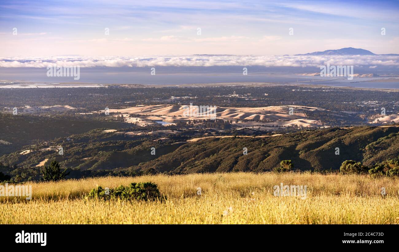 Aerial view of part of Silicon valley, with Stanford University, Palo Alto and Menlo Park spread along the shores of San Francisco Bay; Mount Diablo r Stock Photo