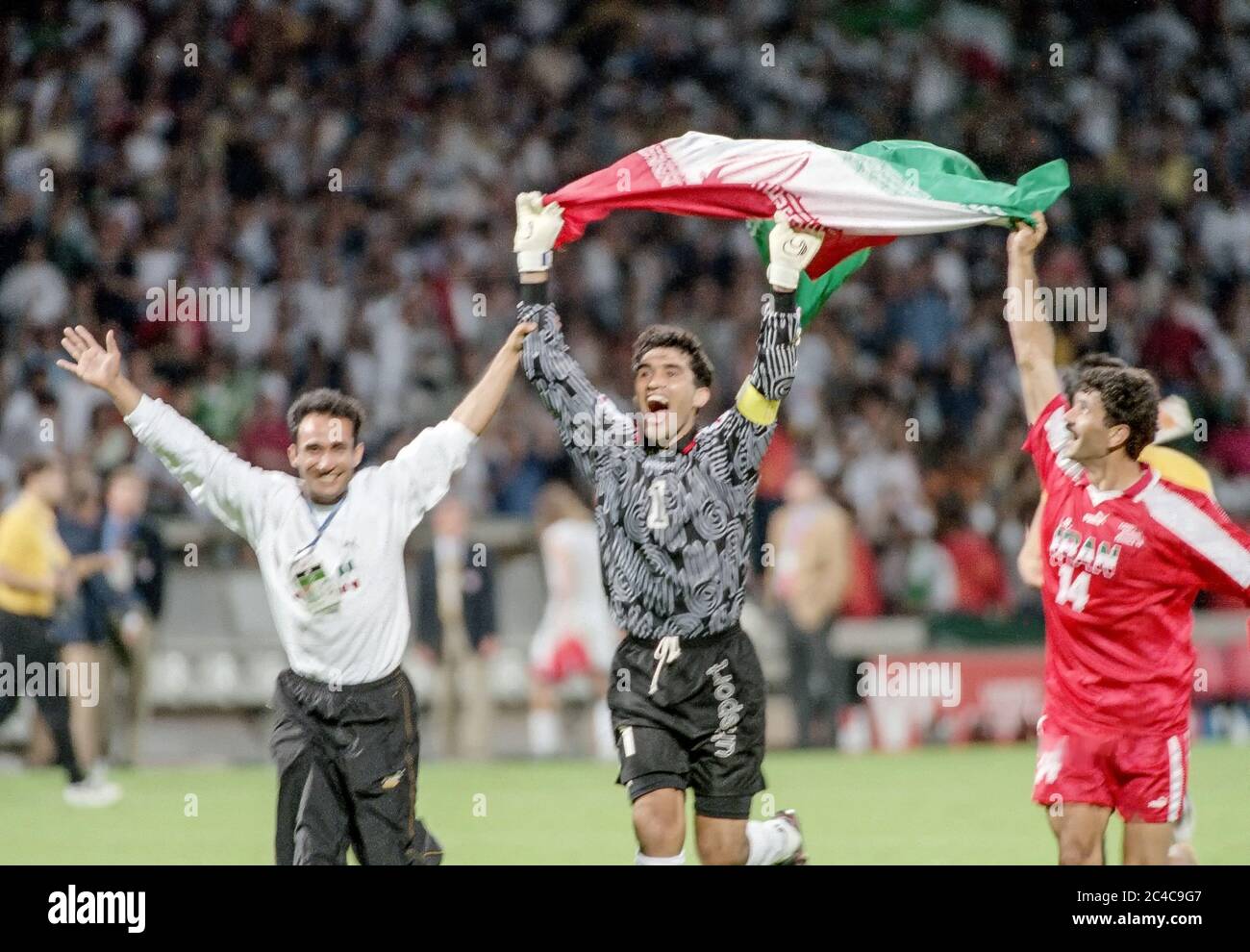 Ahmed ABEDZADEH (1) and  Nader KHANI (14) of Iran after their 1998 World Cup match against the USA. Stock Photo