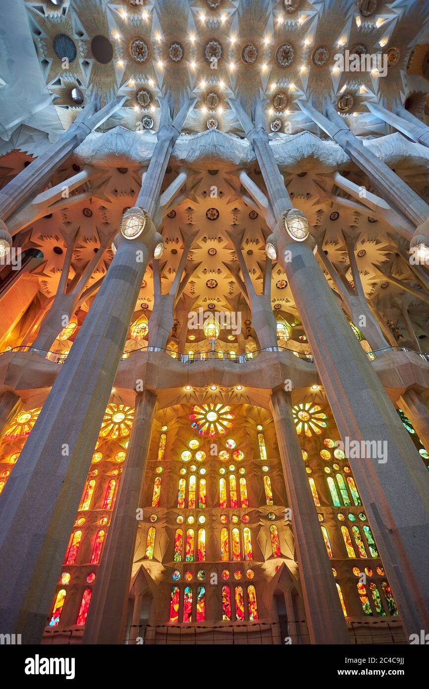 On one side of Sagrada Familia the stained glass windows take advantage ...