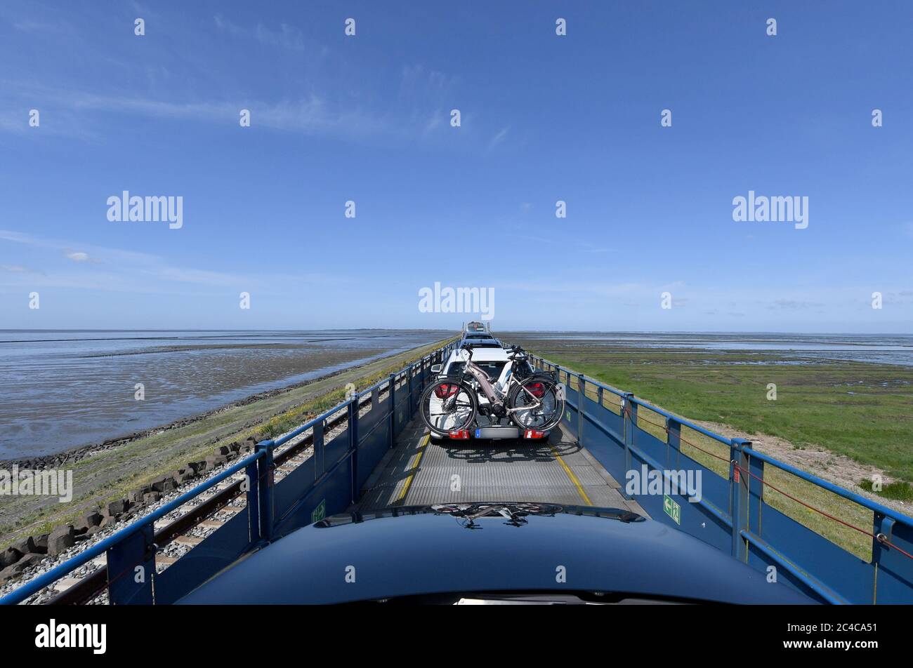 Sylt, Germany. 23rd June, 2020. Cars travel on the Auto Train in the direction of Sylt. (to dpa 'The people are euphoric' - holidays on Sylt in times of Corona') Credit: Carsten Rehder/dpa - ATTENTION: License plate was made unrecognizable/dpa/Alamy Live News Stock Photo