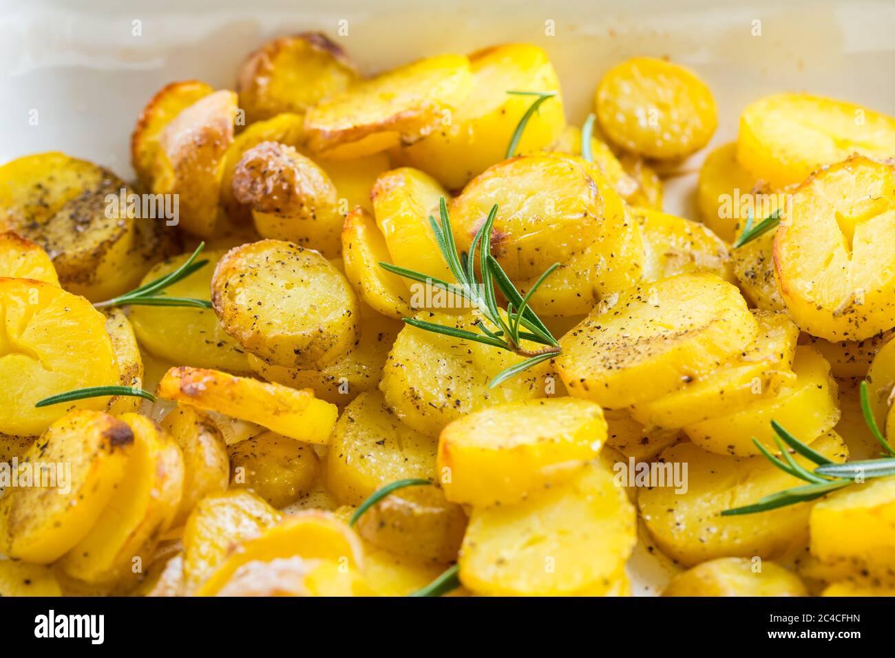 Fried potatoes in baking sheet Stock Photo Alamy