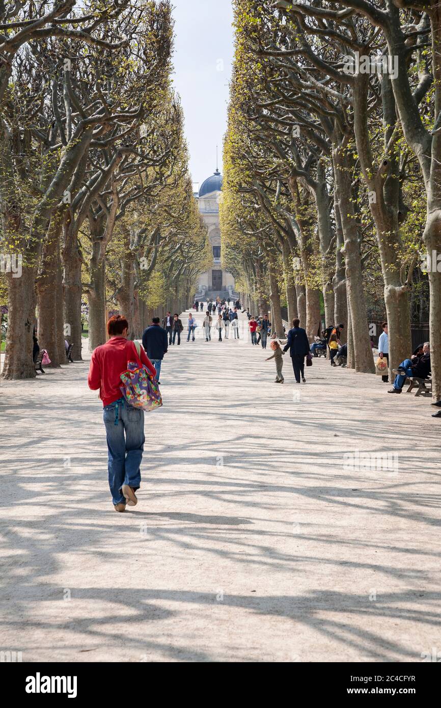 People walking in a park, Paris, France Stock Photo