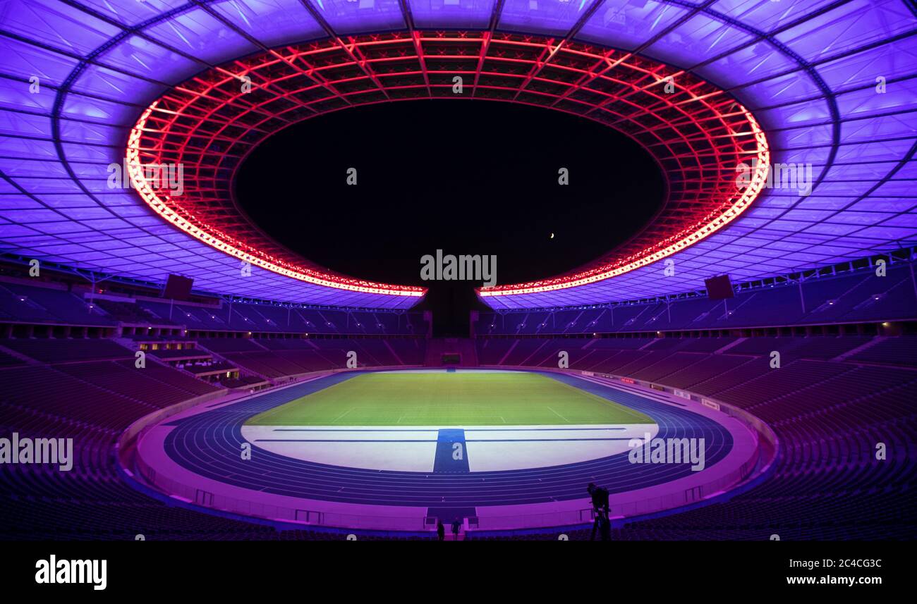 Berlin, Germany. 25th June, 2020. A full-colour LED floodlighting system is  presented in the Berlin Olympic Stadium. Lighting designer Mikki Kunttu,  designer of the opening ceremony of the Olympic Games in Beijing