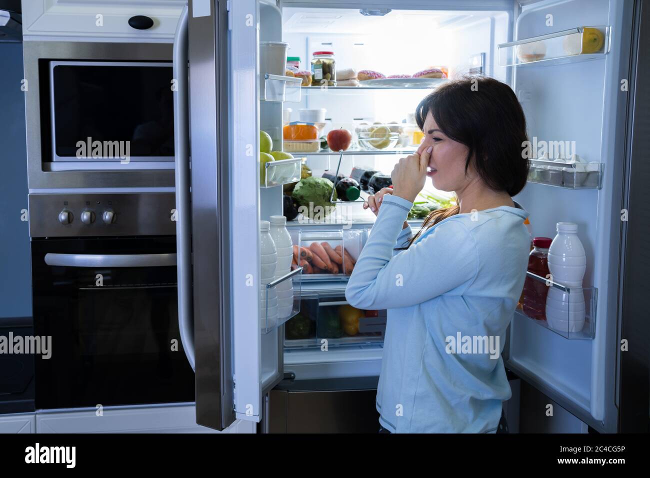 Rotten Food Bad Smell Or Stink In Refrigerator Or Fridge Stock Photo