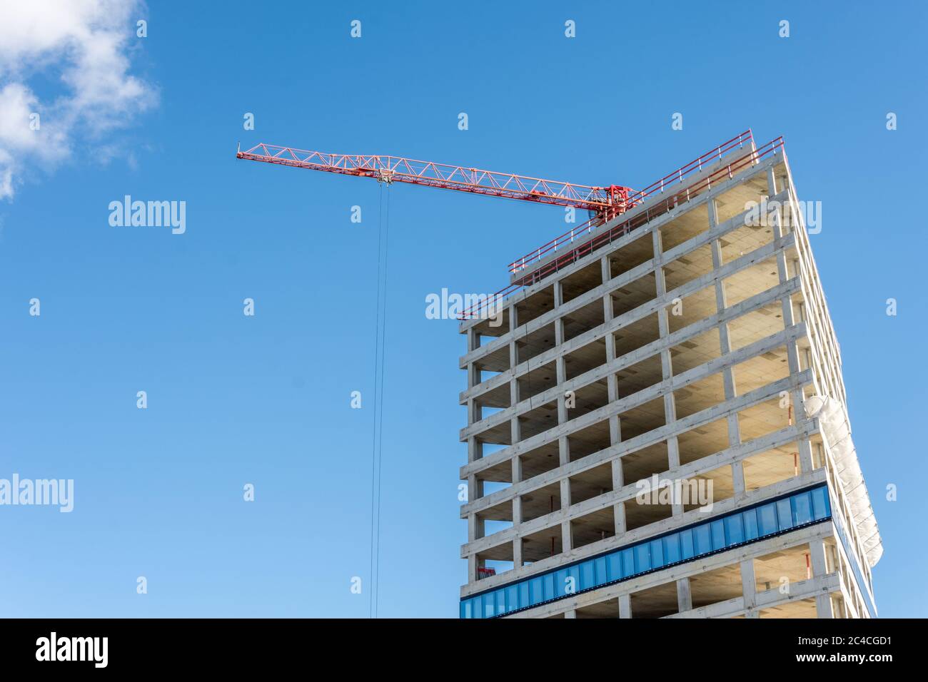 Construction Site With Crane On Blue Sky - Modern Office And Residential Building Under Construction Stock Photo