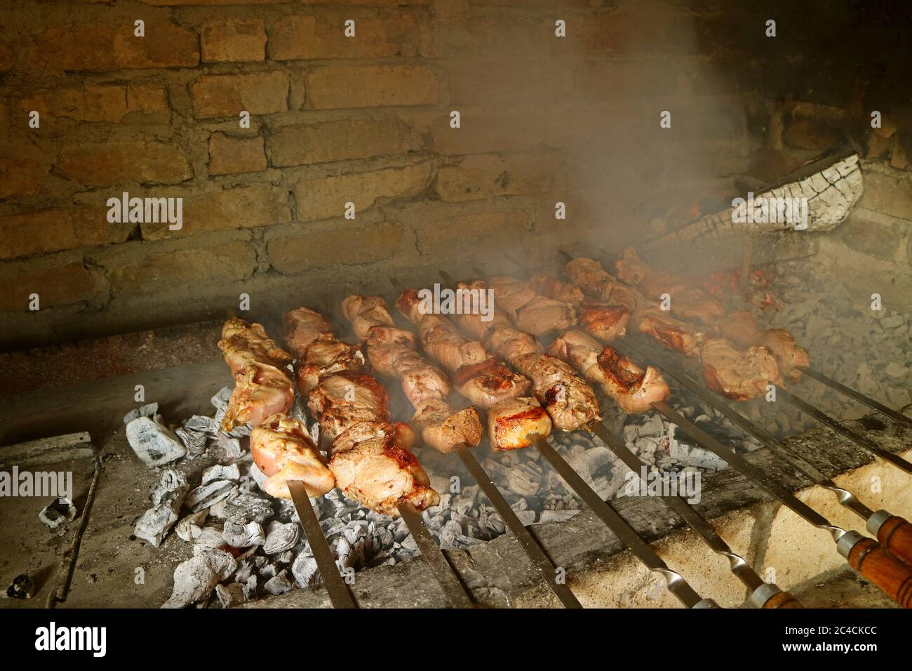 Closeup of Armenian Barbecue or Khorovats Being Grilled in a Traditional  Clay Oven, Lori Province, Armenia Stock Photo - Alamy