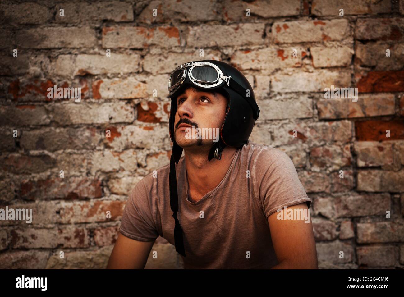lifestyle young man with mustache, car, rock n roll Stock Photo Alamy