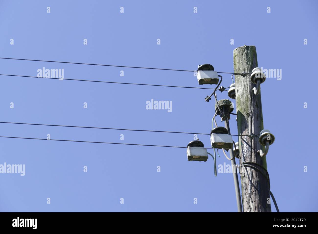 Old telegraph pole, Germany Stock Photo
