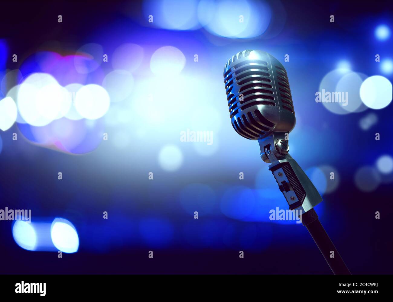 Microphone on stage Stock Photo Alamy