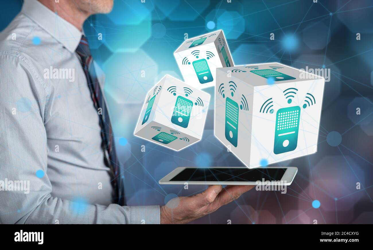 Smart speaker concept above a tablet held by a man Stock Photo