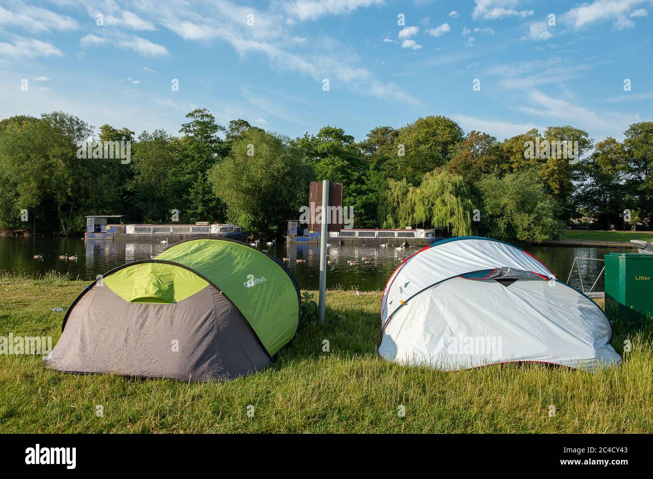 Eton, Windsor, Berkshire, UK. 26th June, 2020. Zipped up tents early in the morning as people have camped overnight on the Brocas in Eton, Windsor, Berkshire. Currently camping overnight is not allowed during the Coronavirus lockdown and those breaching the rules are at risk of facing large fines. Credit: Maureen McLean/Alamy Live News Stock Photo
