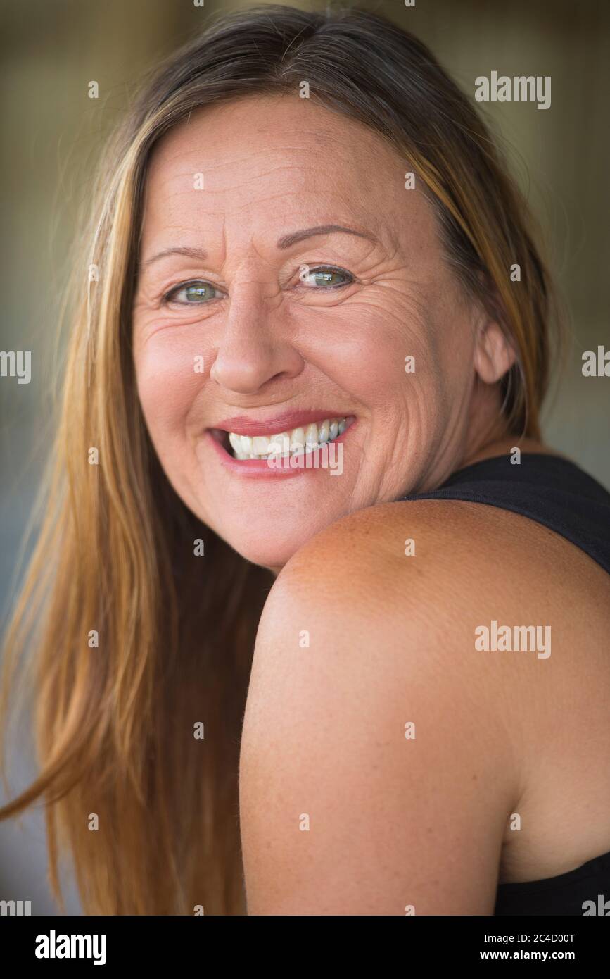 Friendly smiling mature woman black hi-res stock photography and images ...