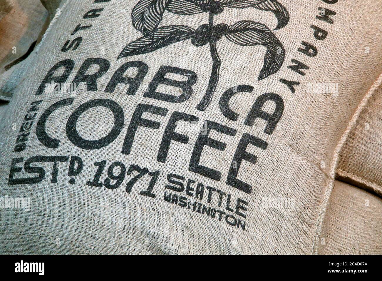Jute bag containing coffee Stock Photo Alamy