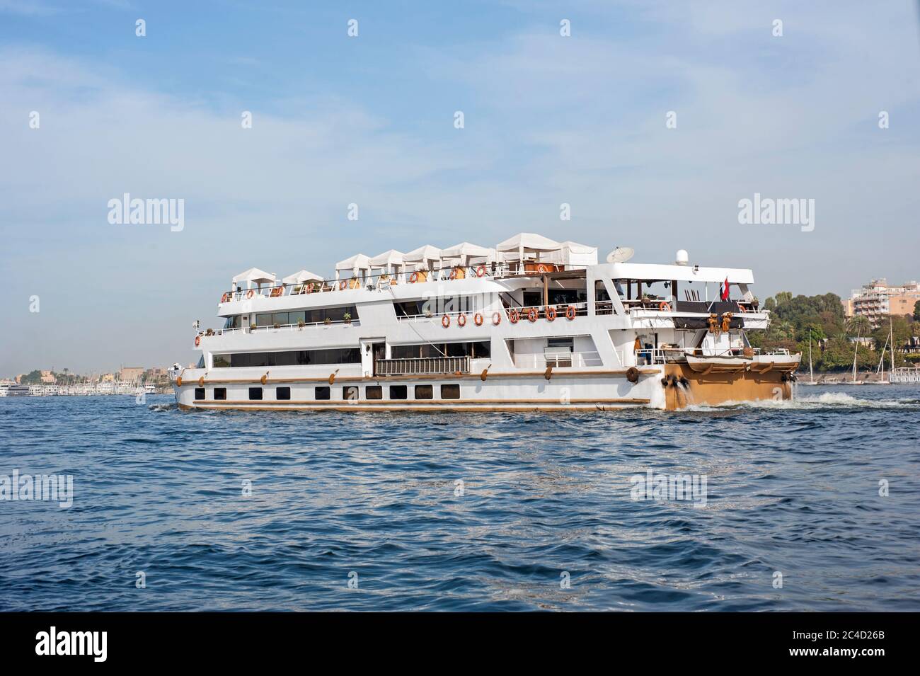 Large luxury traditional Egyptian river cruise boat sailing on the Nile