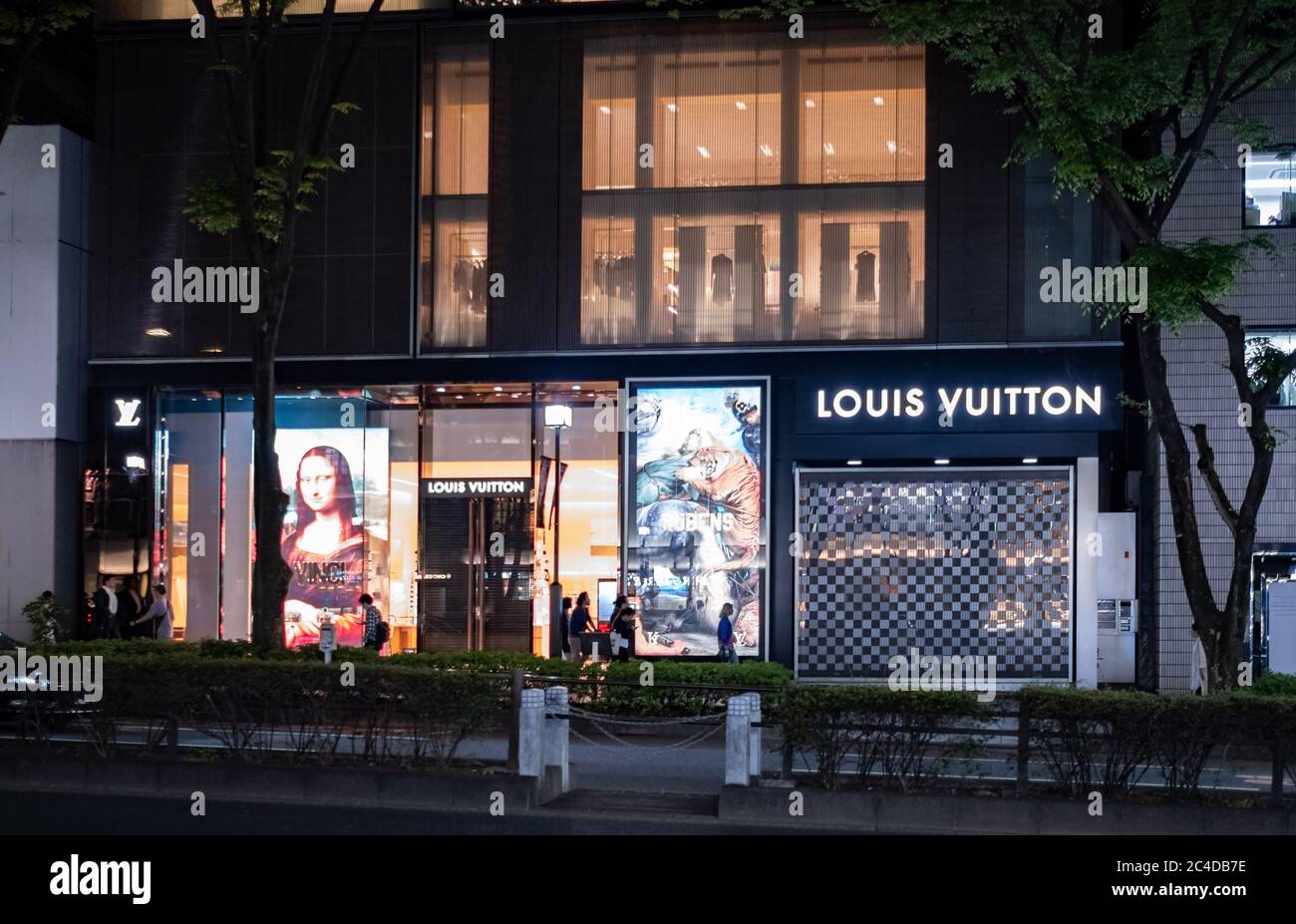 Louis Vuitton store front in Omotesando at night, Tokyo, Japan Stock Photo