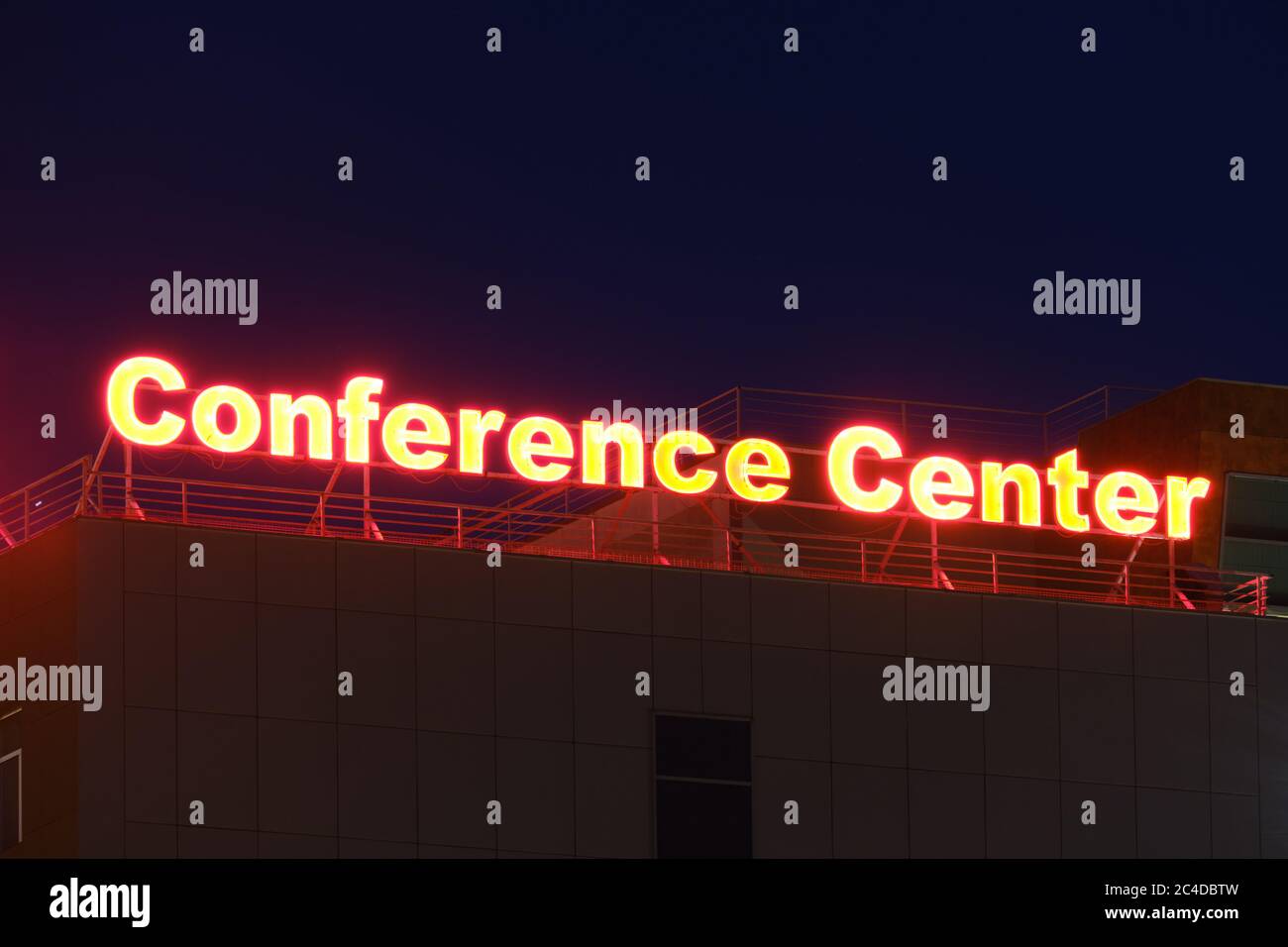 Conference Center sign on top of RIN Grand Hotel building at night, near Vitan, in Bucharest, Romania - May 28, 2020. Stock Photo