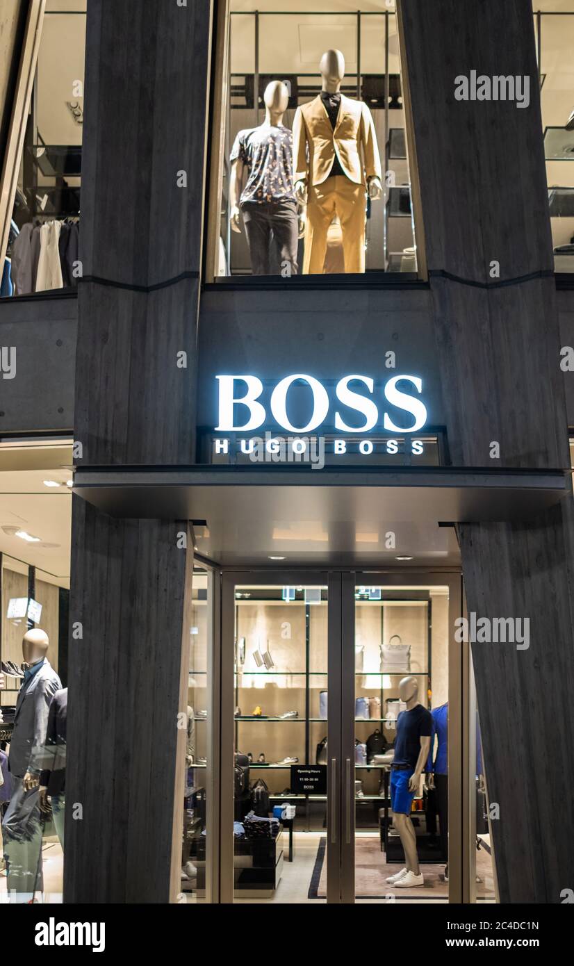 platform Uitvoerbaar marathon Hugo Boss store front in Omotesando Street at night, Tokyo, Japan Stock  Photo - Alamy