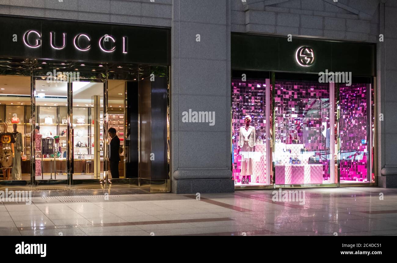 Gucci store front in Omotesando street at night, Tokyo, Japan Stock Photo -  Alamy