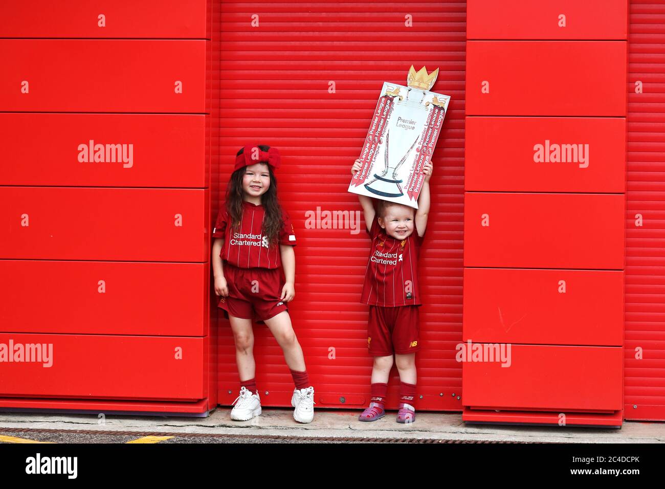 Kendall Hope, aged 5 (left) and Sadie Howard, aged 3, pose with a cardboard cutout of the