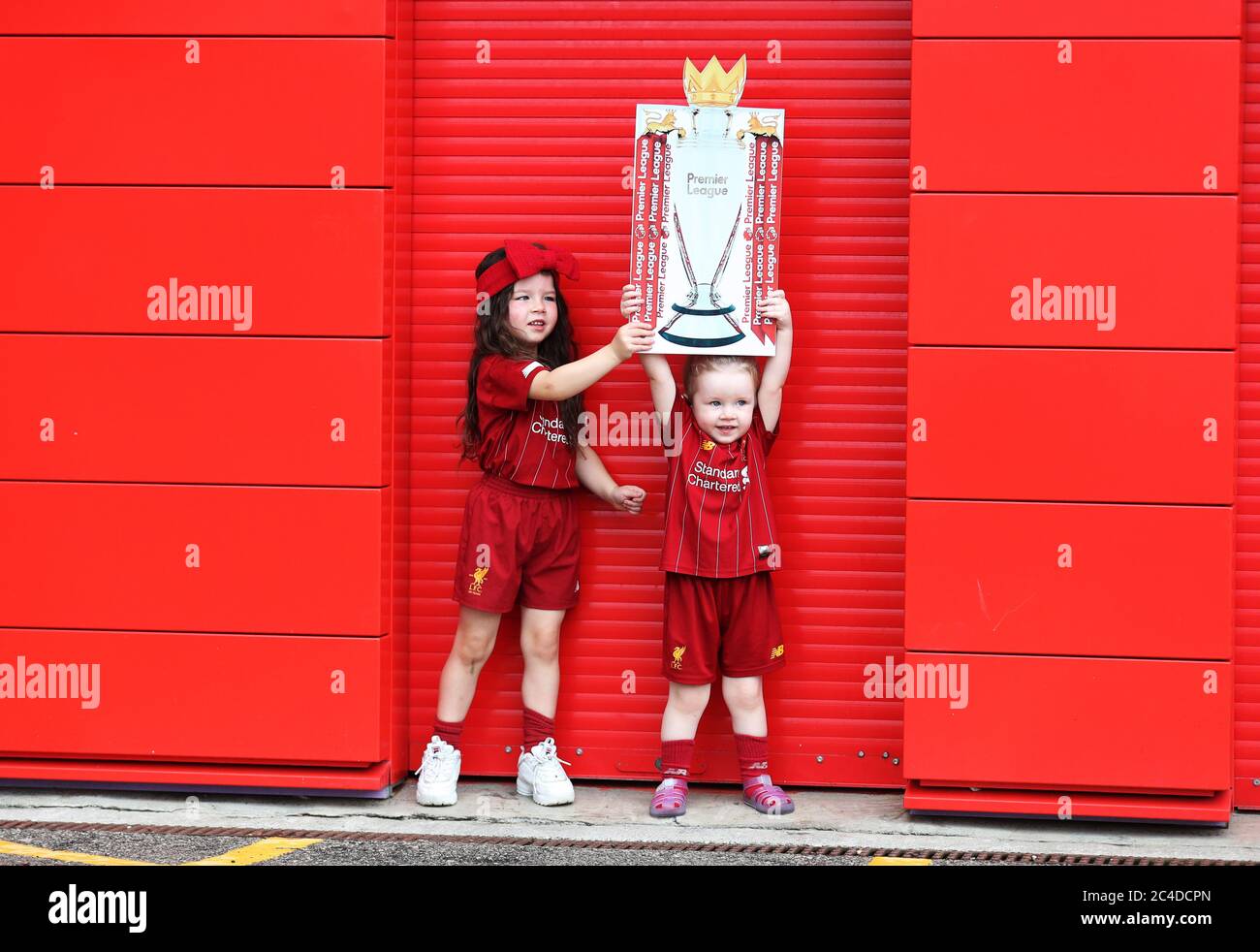 Kendall Hope, aged 5 (left) and Sadie Howard, aged 3, pose with a cardboard cutout of the