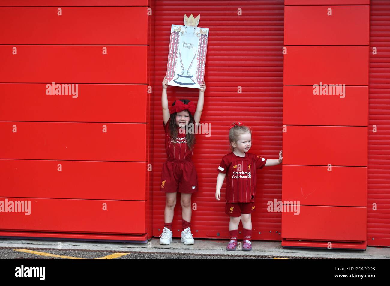 Kendall Hope, aged 5 (left) and Sadie Howard, aged 3, pose with a cardboard cutout of the