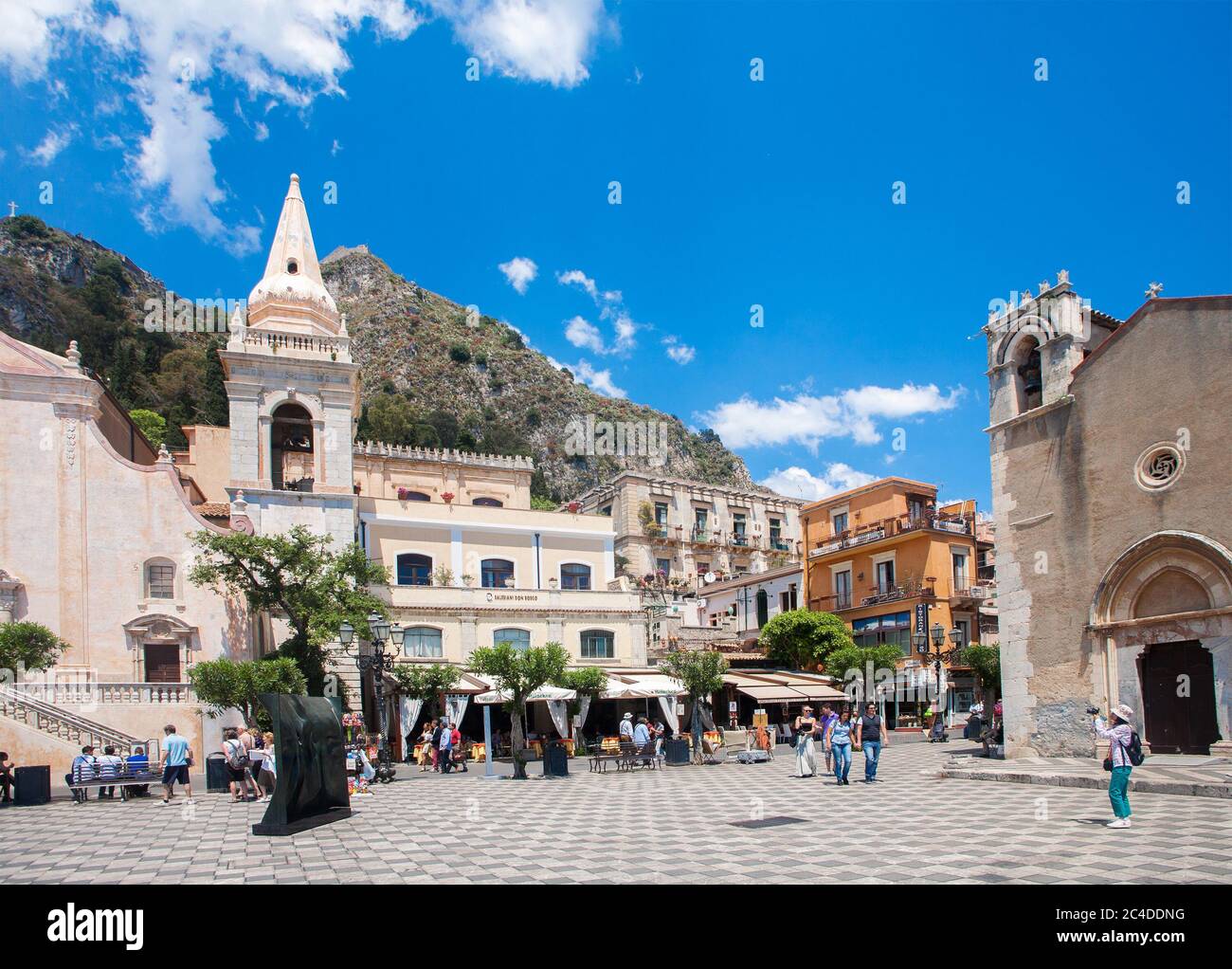 TAORMINA, ITALY - MAY 11, 2012: Taormina town main square center with ...