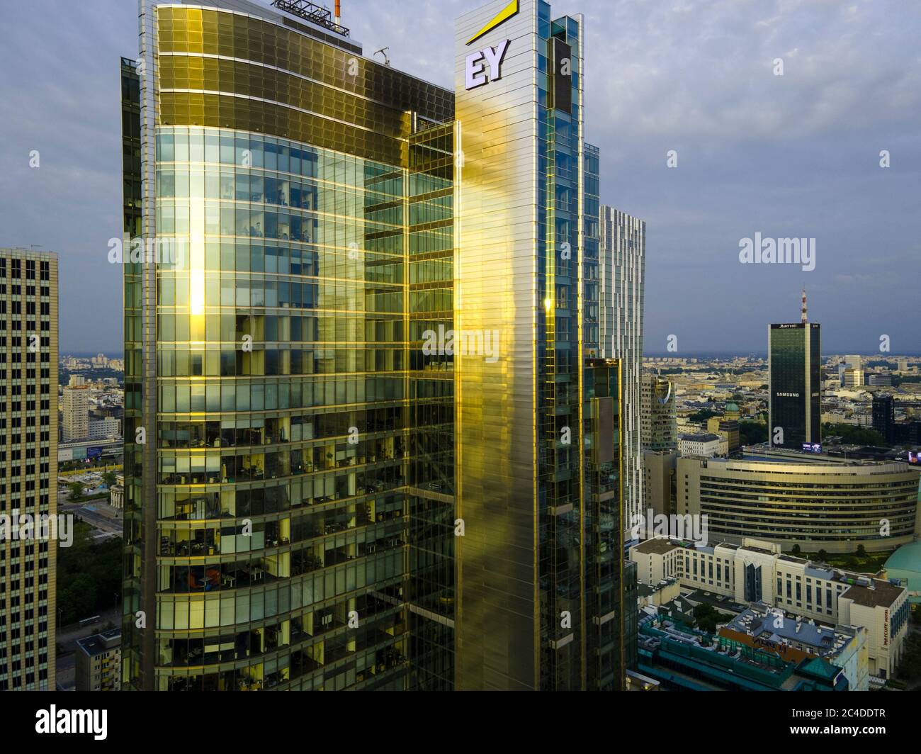 The Ernst and Young logo is seen on the Rondo 1 building on the Rondo ONZ roundabout on June 11, 2020 in Warsaw, Poland. Stock Photo