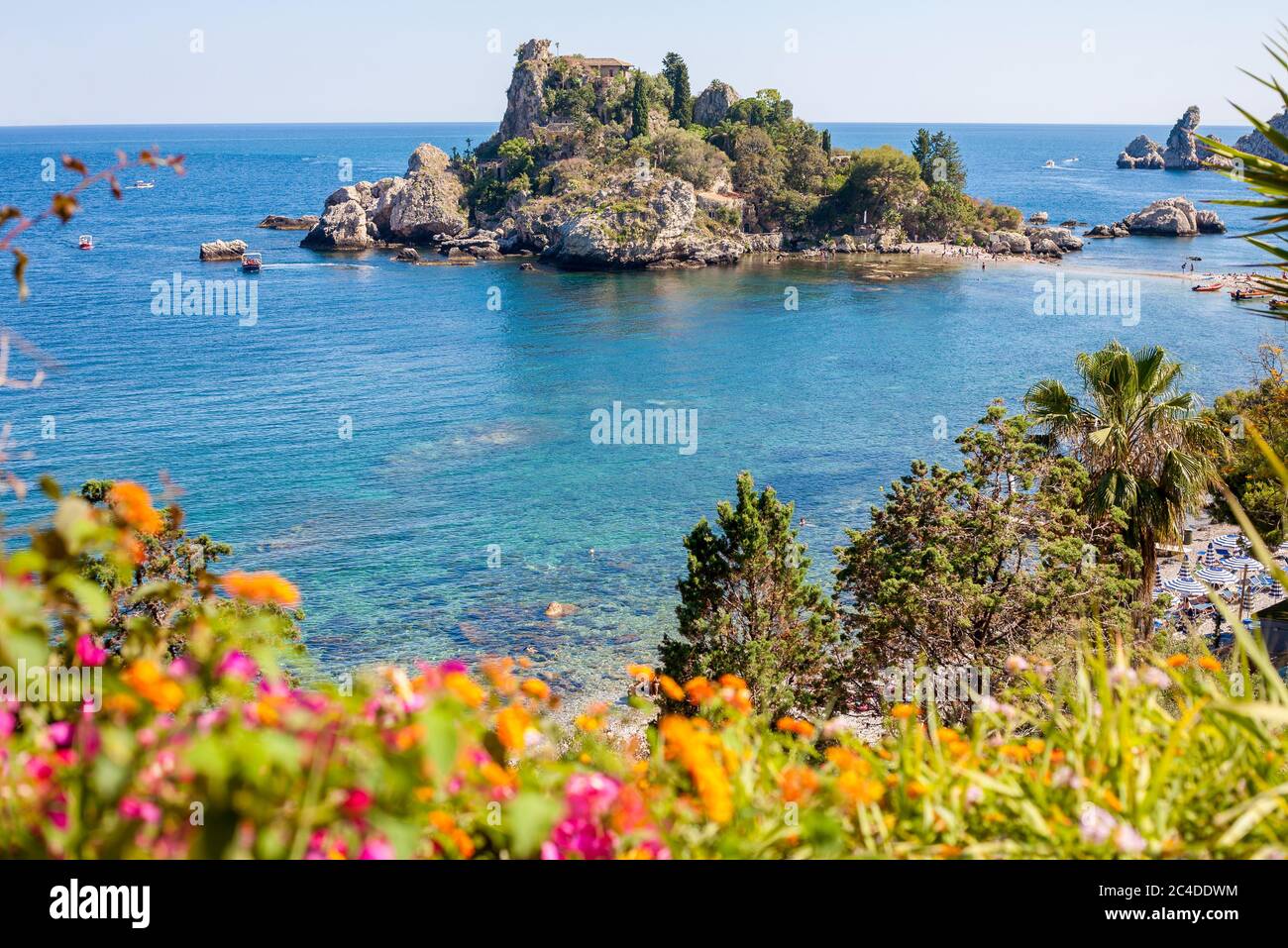 View of Isola Bella with flowers in Taormina, Sicily, Italy Stock Photo ...