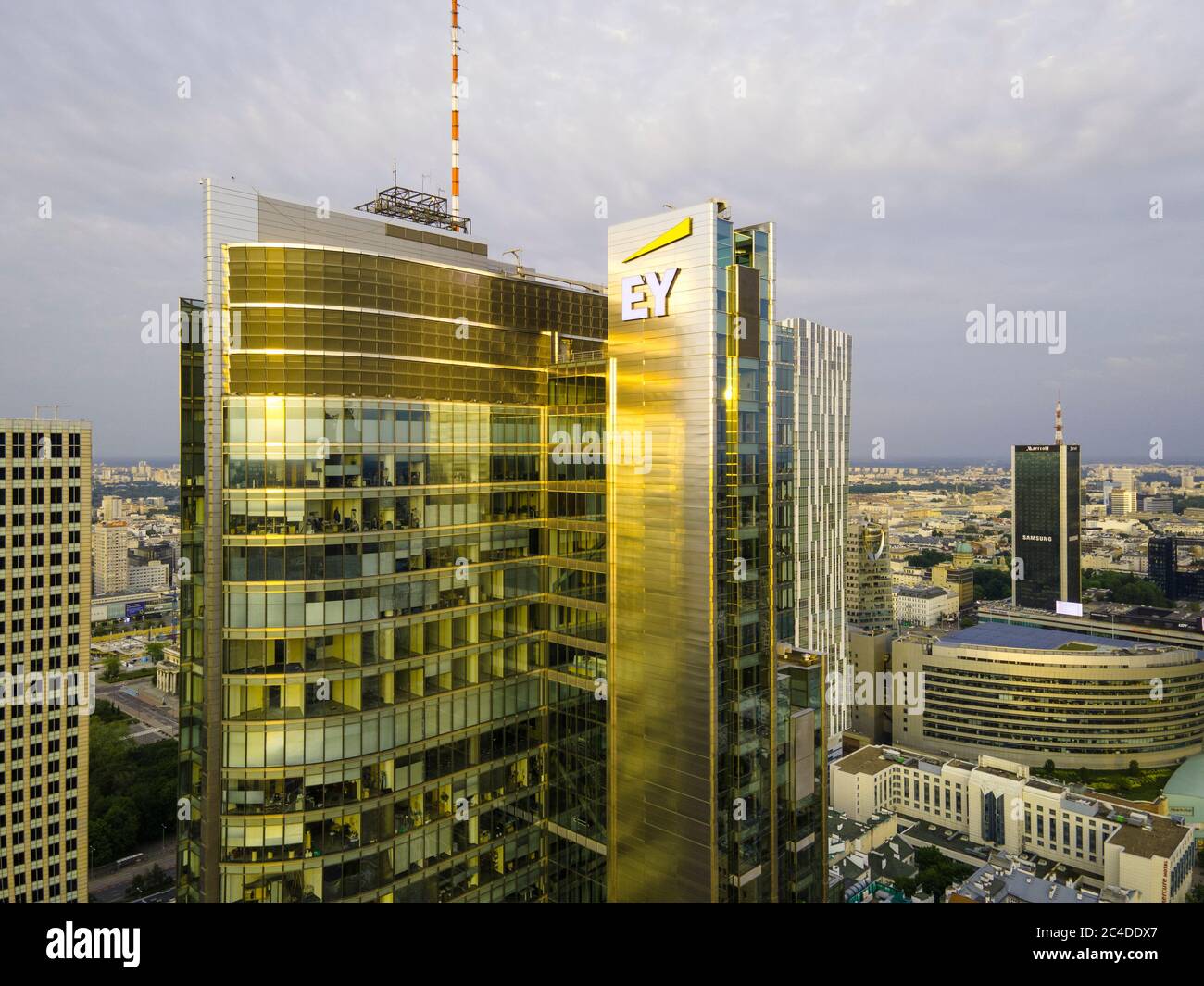 The Ernst and Young logo is seen on the Rondo 1 building on the Rondo ONZ roundabout on June 11, 2020 in Warsaw, Poland. Stock Photo