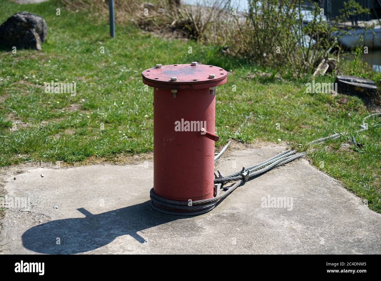 Bollards are ideal for mooring ships, photographed on the port Stock Photo