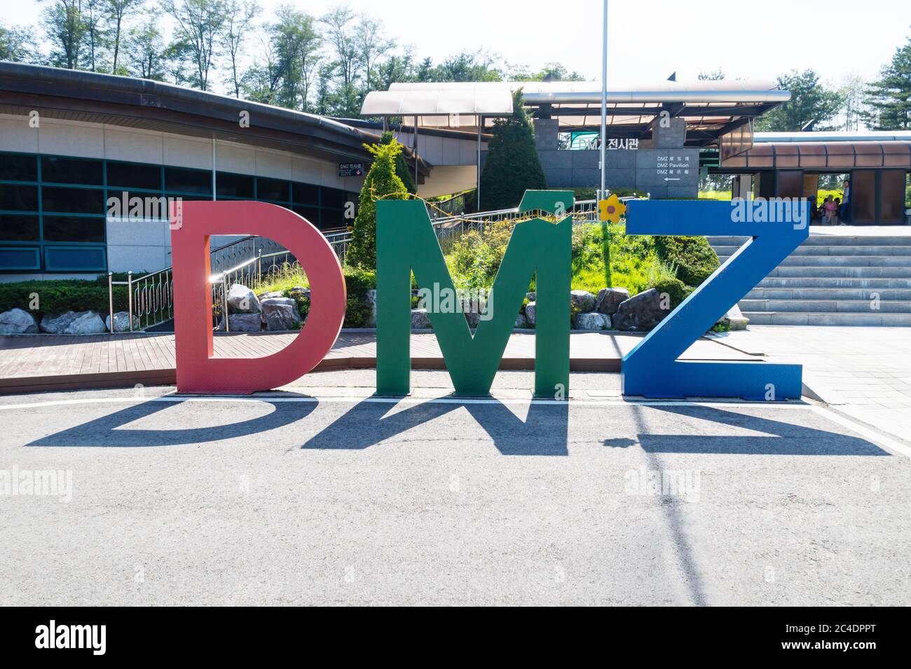 Colourful sign for the Demilitarised Zone with shadows, on the North ...
