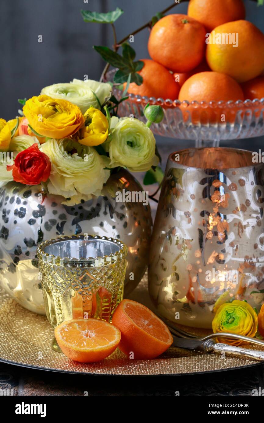 Glass vase with oranges hi-res stock photography and images