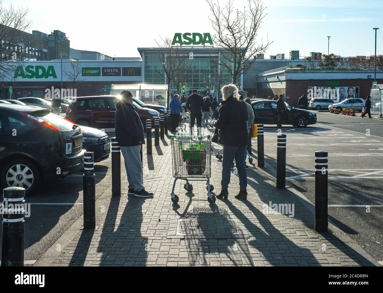 early morning queue at ASDA supermarket during the covid-19 coronavirus pandemic outbreak. 26th march 2020 Stock Photo