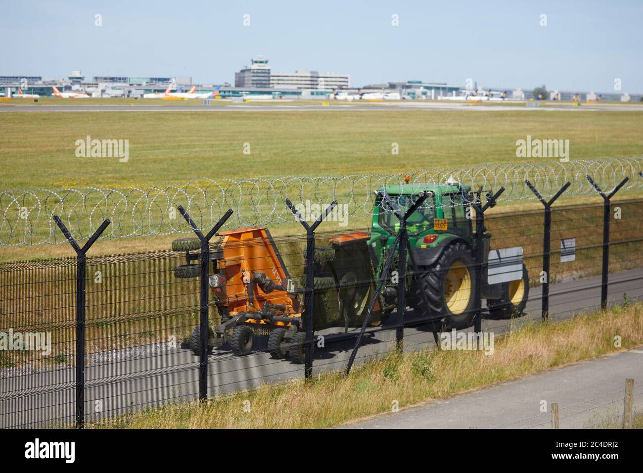 Manchester Airport perimeter fence, used by cyclist and walkers Stock Photo