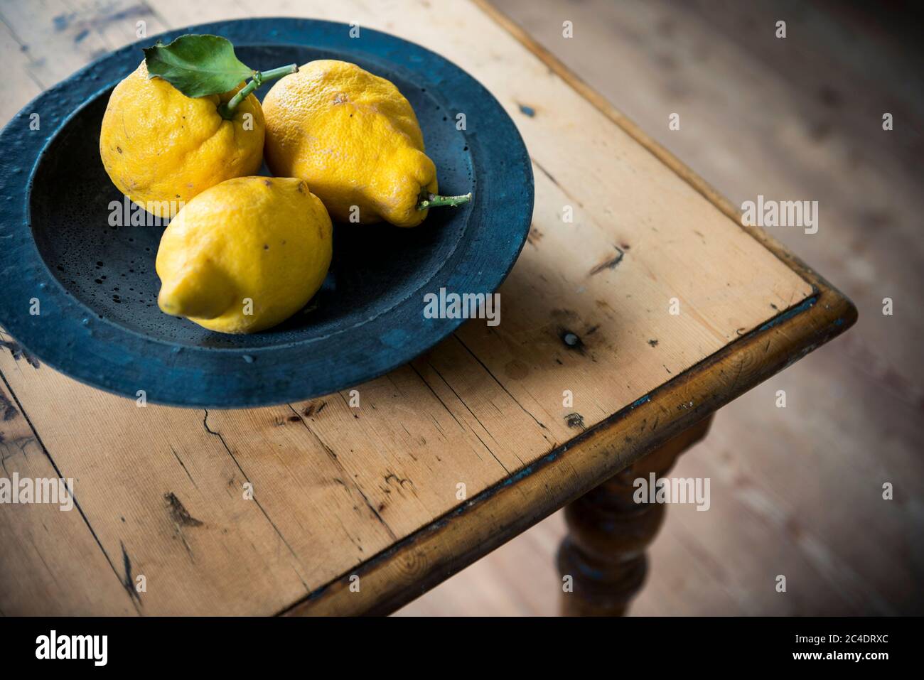 Concrete Fruit Bowl with Amalfi Lemons in a Country Style House Stock Photo