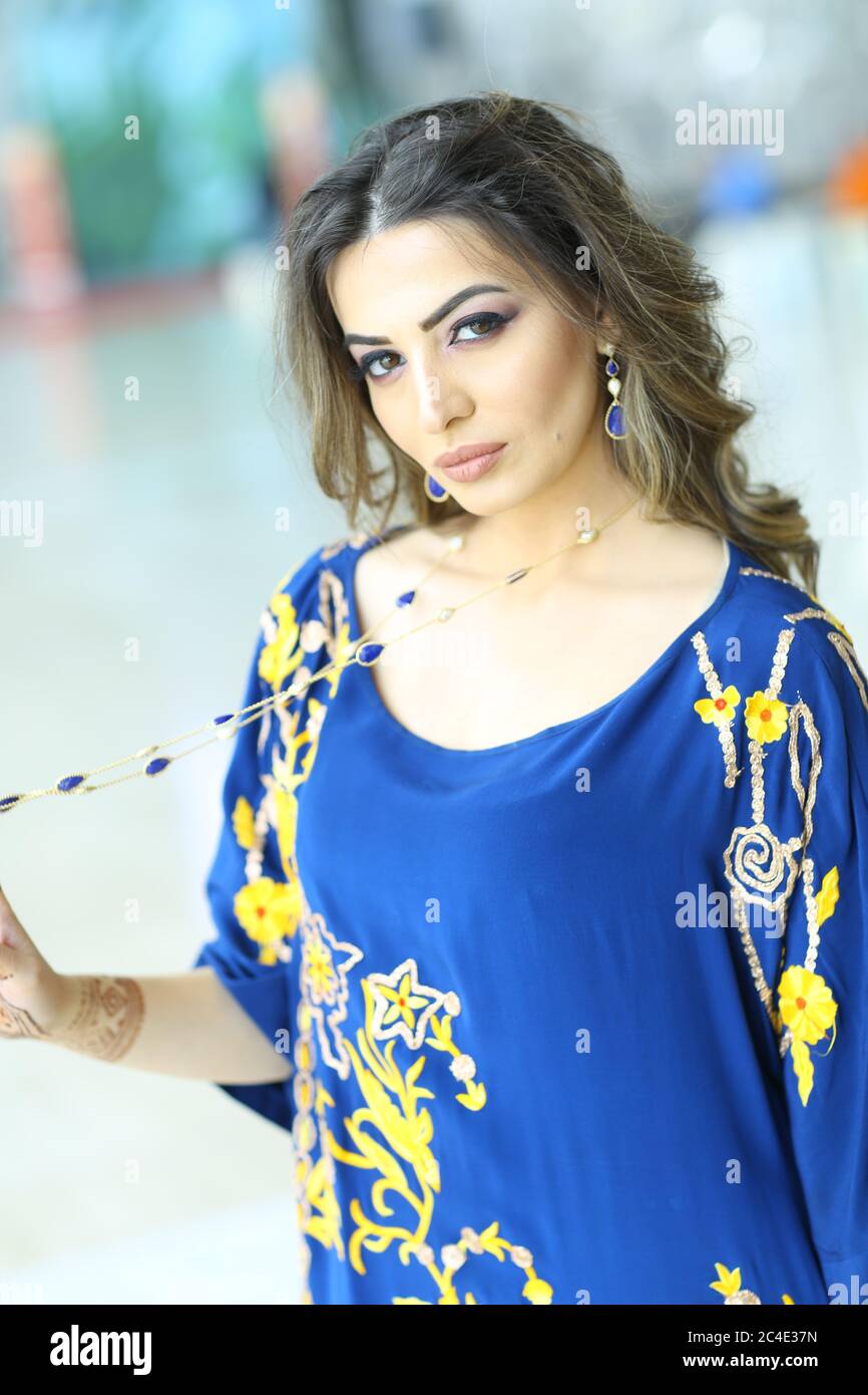 Arab Women in Light Blue Traditional arab Dress Stock Photo - Alamy