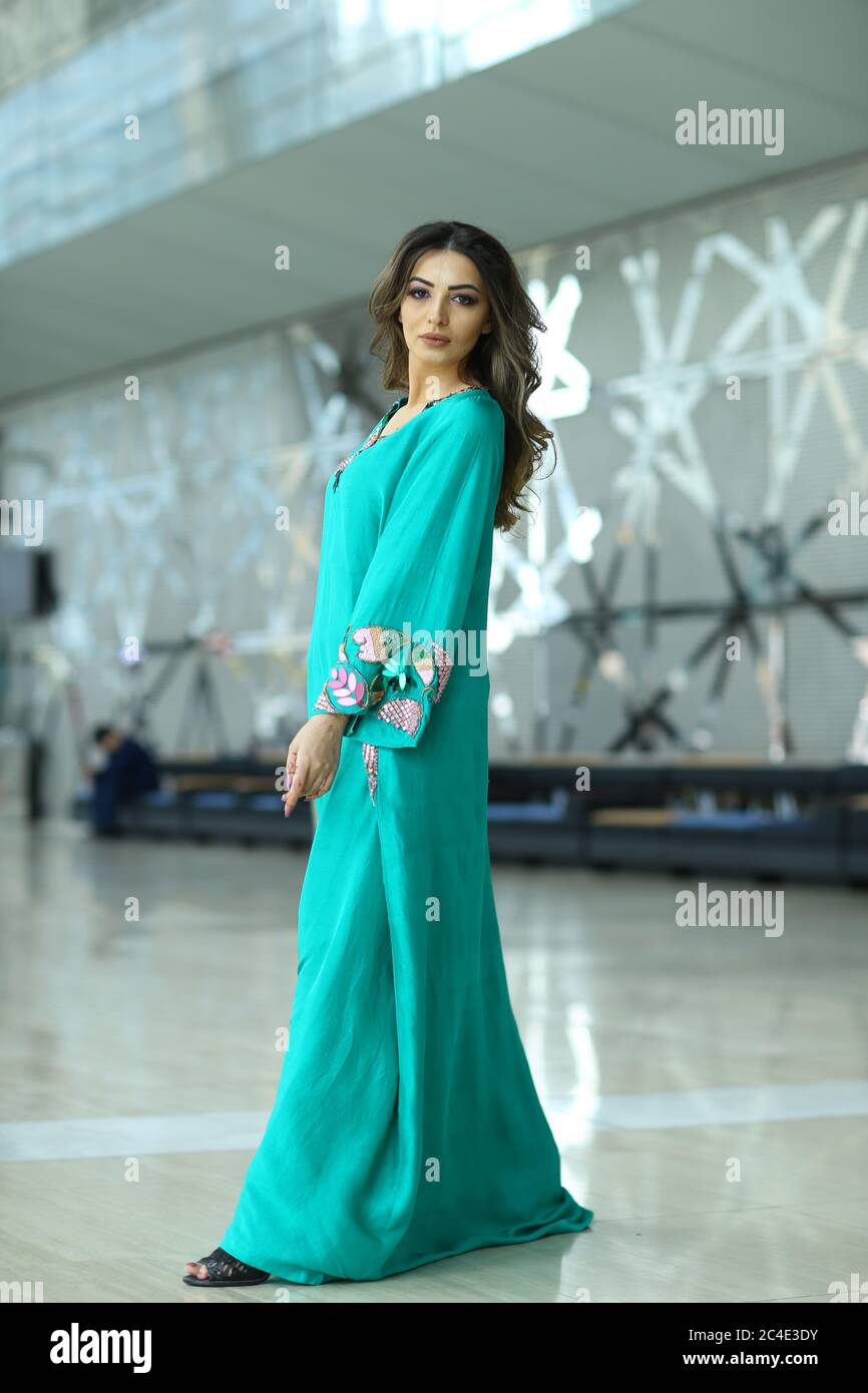 Arab Women in Turquoise Traditional Dress Stock Photo - Alamy