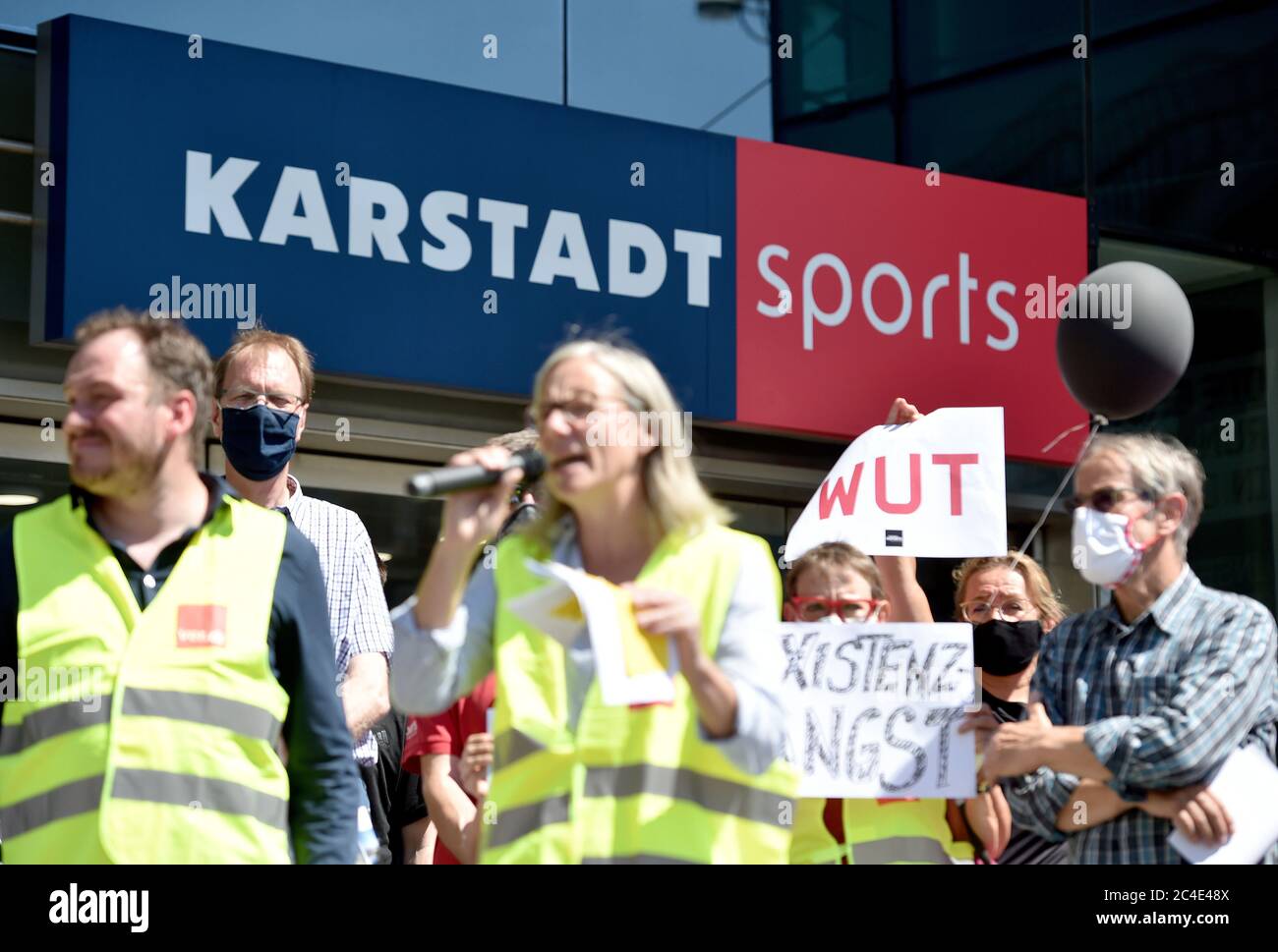 26 June 2020, North Rhine-Westphalia, Dortmund: Works councils of Galeria Karstadt Kaufhof and Karstadt Sports demonstrate the Karstadt Sports shop in the city centre. The ailing department store group had announced the closure of 62 of its 172 department stores last week. The company headquarters in Essen and the city of Dortmund have been hit particularly hard. In both cities, the remaining two department stores are to be closed. Photo: Caroline Seidel/dpa Stock Photo
