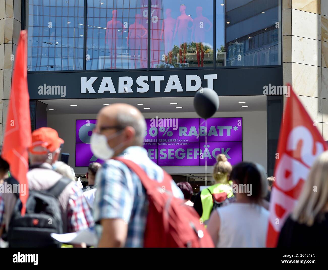 26 June 2020, North Rhine-Westphalia, Dortmund: Works council members of Galeria Karstadt Kaufhof and Karstadt Sports demonstrate in front of one of the two stores in the city centre. The ailing department store group had announced the closure of 62 of its 172 department stores last week. The company headquarters in Essen and the city of Dortmund are particularly hard hit. In both cities, the remaining two department stores are to be closed. Photo: Caroline Seidel/dpa Stock Photo