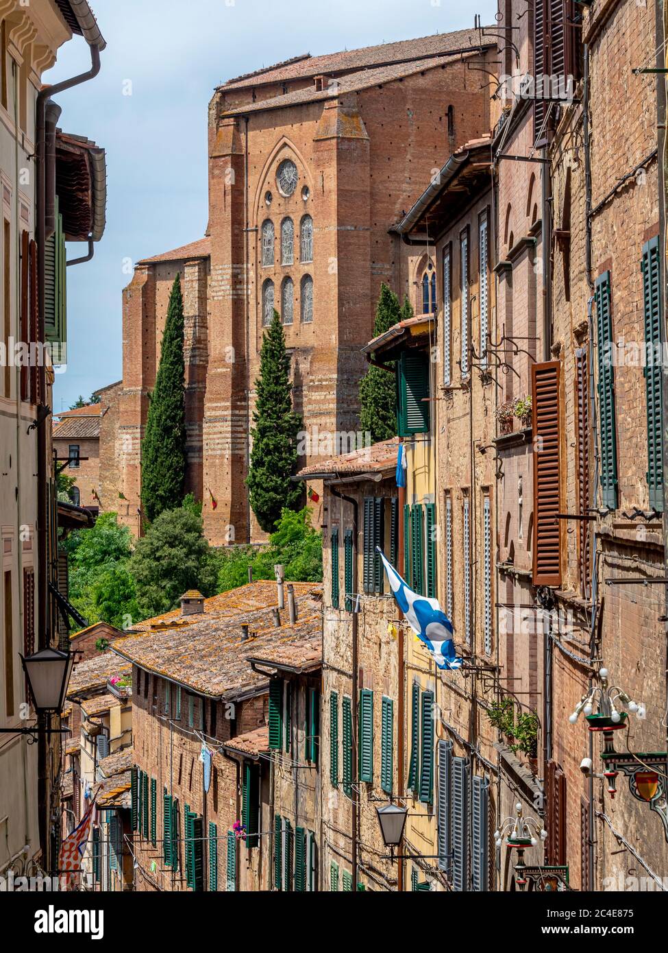 Traditional Siena houses with wooden window shutters. Siena. Italy. Stock Photo