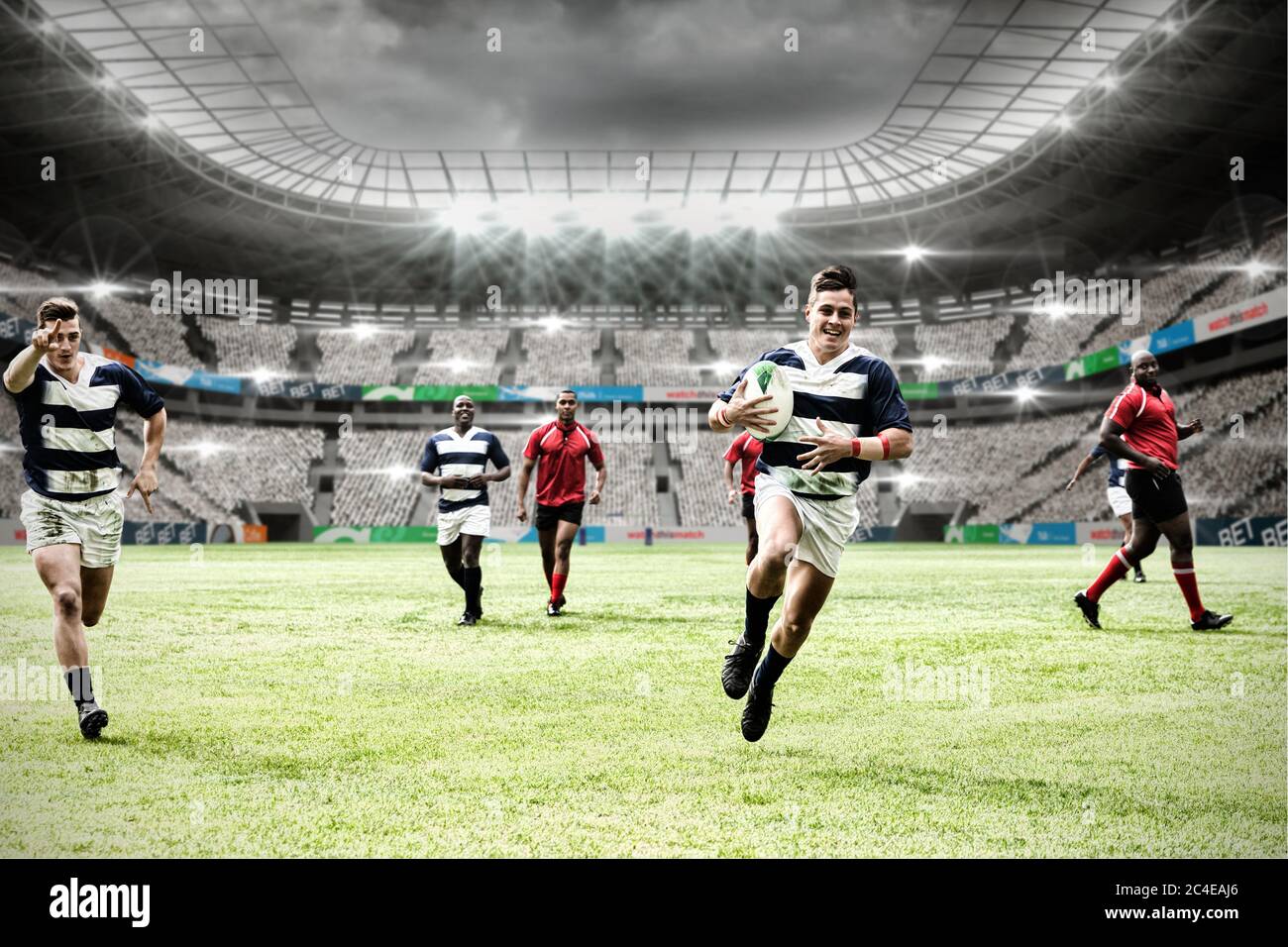 Digital composite image of team of rugby players playing rugby in ...