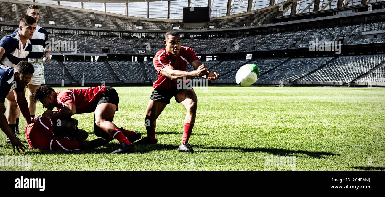 Digital composite image of rugby player throwing the ball to his