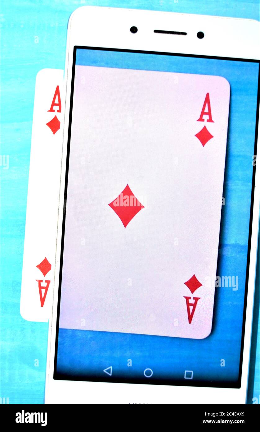 play card for poker and telephone Stock Photo