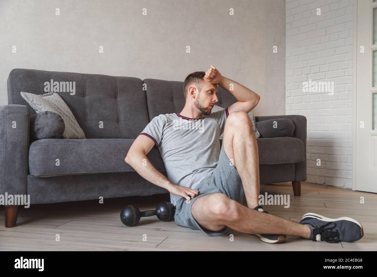 Tired after exercise and workout. Overtraining at home during