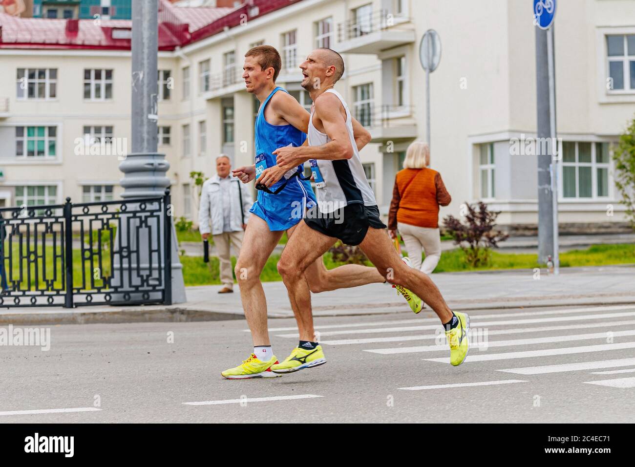 Ekaterinburg, Russia - August 6, 2017: blind man athlete runner run with his guide runner in Europe-Asia Marathon Stock Photo