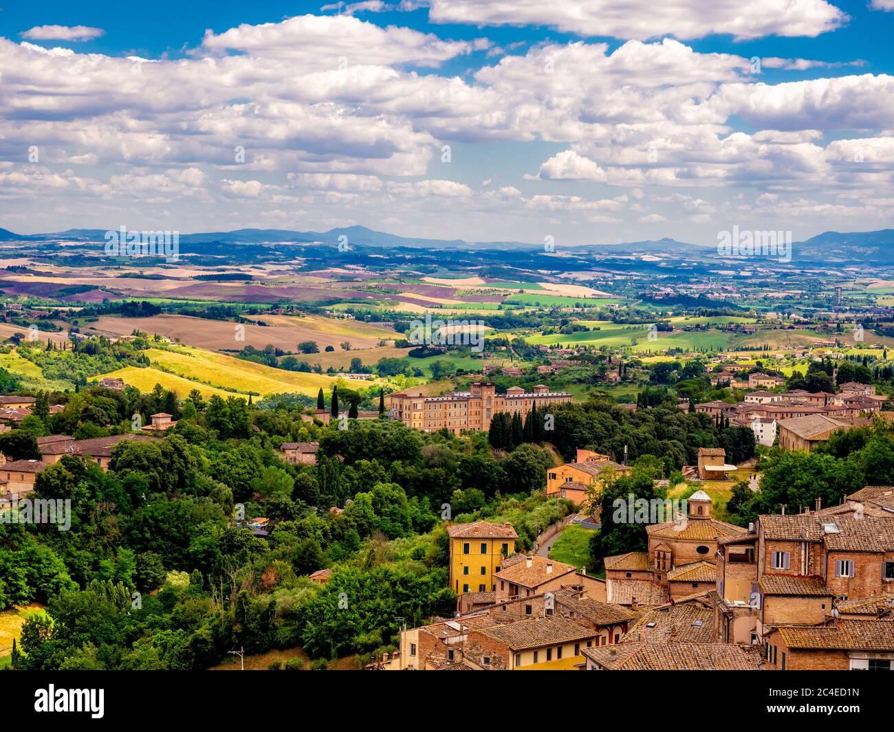 Aerial view of Siena with Villa il Pavone  and the Tuscan countryside in the distance.  Italy. Stock Photo