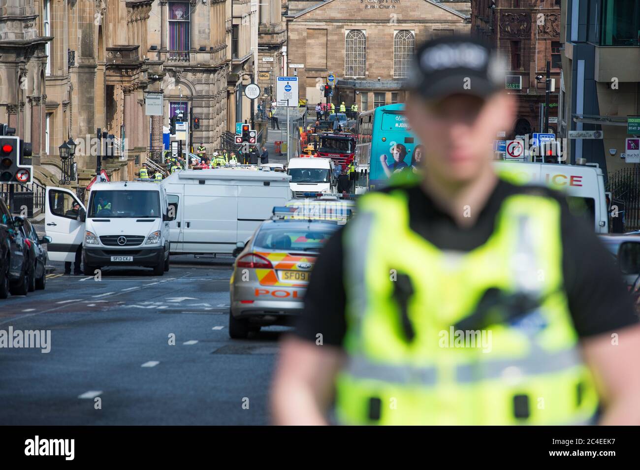 Glasgow, Scotland, UK. 26th June, 2020. Pictured: A major police incident has been declared in Glasgow as 6 people have been stabbed including a police officer and police shooting dead the attacker at a major incident at the Park Inn in West George Street which is hosting asylum seekers. Credit: Colin Fisher/Alamy Live News Stock Photo
